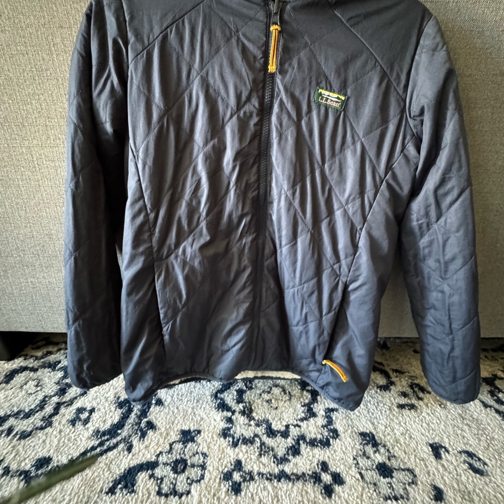 L.L. Bean navy blue quilted reversible light weight winter coat. Fleece lining.